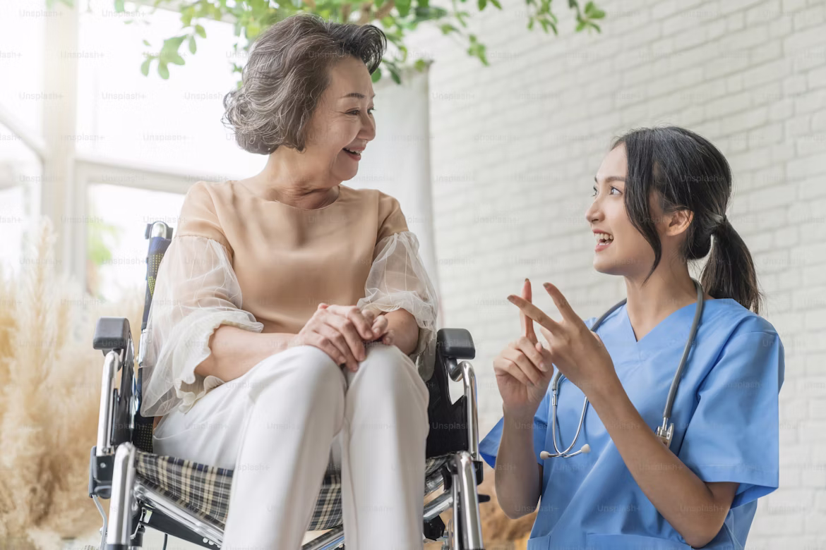 Caregiver assisting elderly